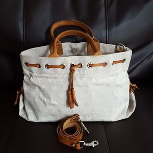 Dooney and Burke Fabric tote with tassels !!